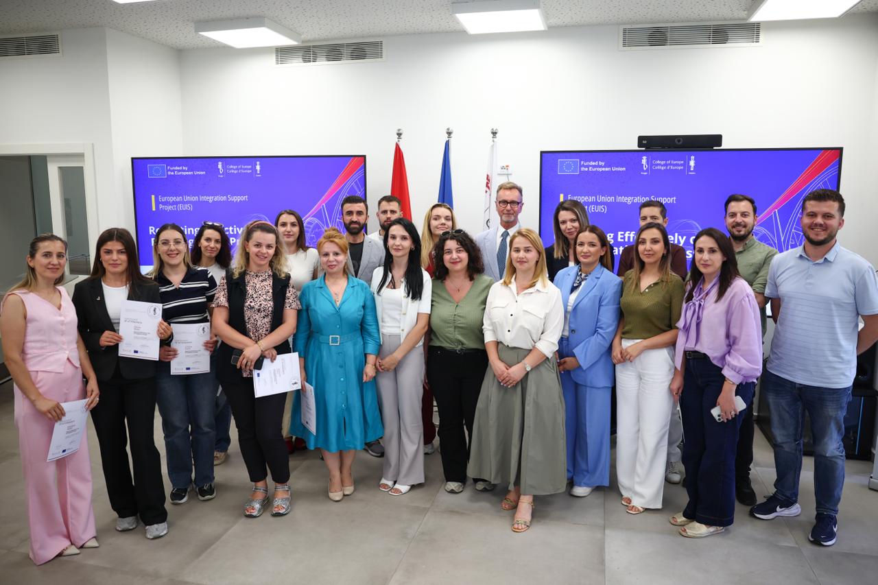 Participants receiving certificates during an EUIS Project certification ceremony attended by the EU Ambassador to Albania.